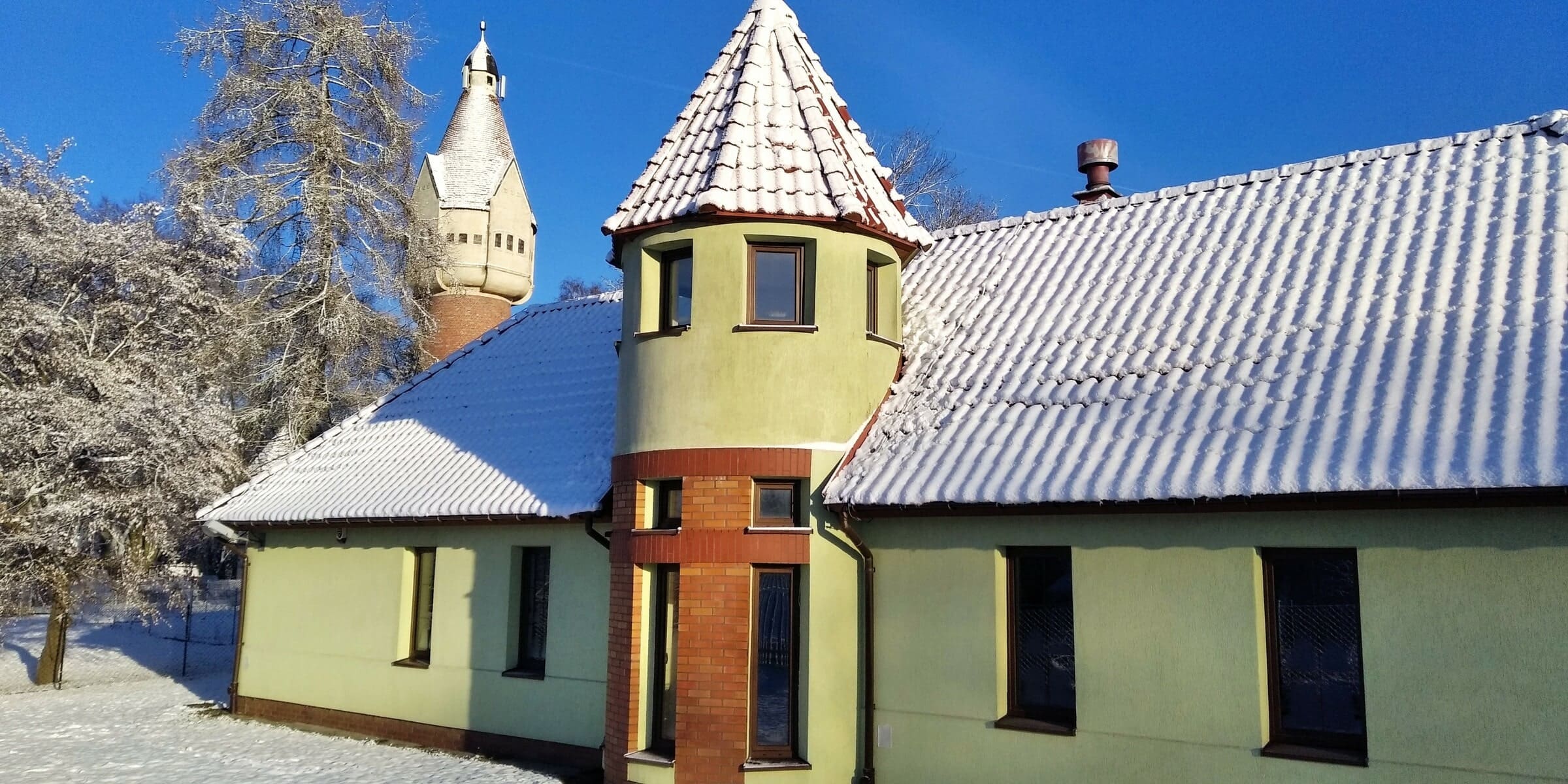 Baner Zakładu Gospodarki Komunalnej i Mieszkaniowej Pasym Sp. z o.o.