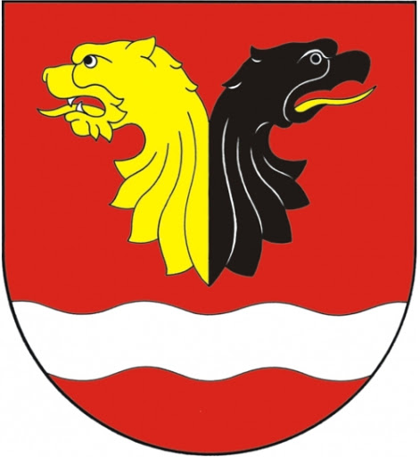 Obrazek przedstawia herb Gminy Włocławek. Herb wyobraża w czerwonym polu srebrną rzekę, a nad nią dwie złączone głowy lwa (żółta) i orła (czarna).